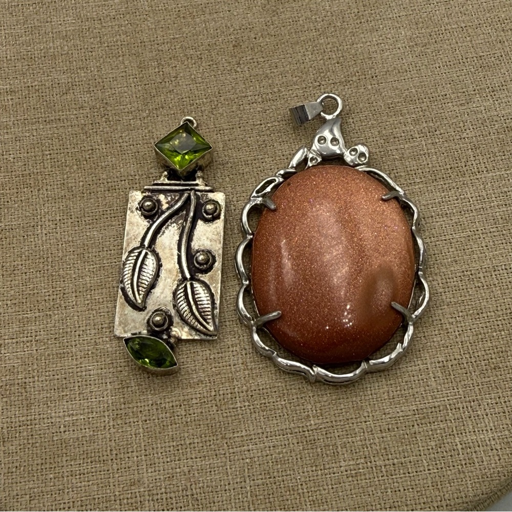 Set of two Silver and Brown Stone Pendant Set